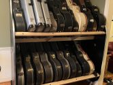two tiered shelf system holding guitar cases