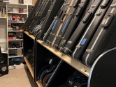 closet with guitar shelves