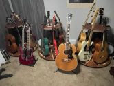 three carousel guitar stands